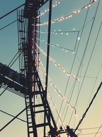 Low angle view of power lines