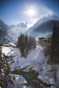 Scenic view of snowcapped mountains against sky