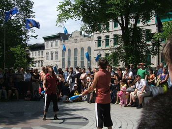 People standing in front of city street