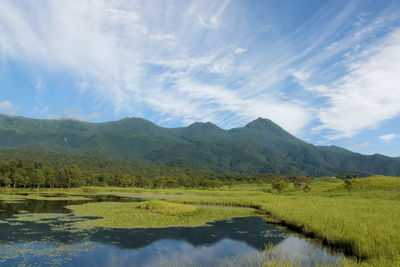 Scenic view of shiretoko goko lakes and mountains against sky in hokkaido, japan