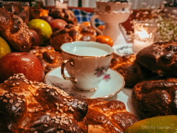 Close-up of cup and coffee on table