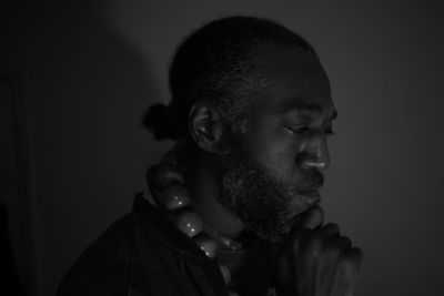 Portrait of young man looking away