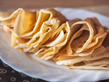 High angle view of bread in plate on table