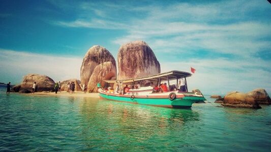 VIEW OF BOATS IN SEA