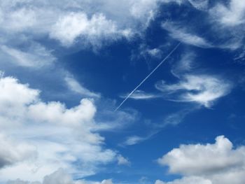 Low angle view of vapor trail in sky