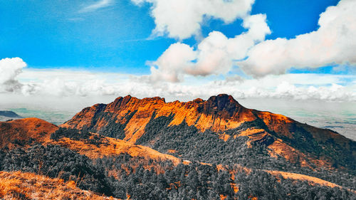 Panoramic view of rocky mountains against sky