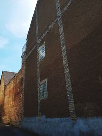 Low angle view of old building against sky