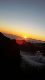 Scenic view of landscape against sky during sunset