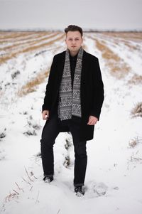 Portrait of man in snow