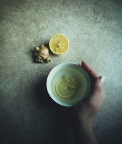 Person holding tea