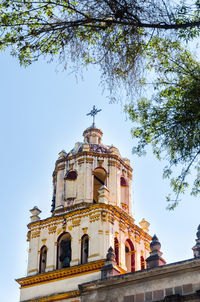 Low angle view of church against sky