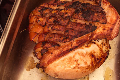 High angle view of meat on barbecue