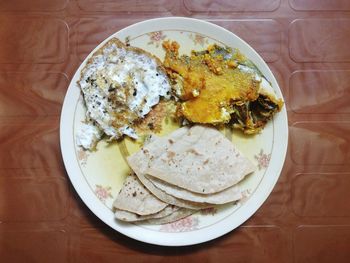 High angle view of breakfast served on table