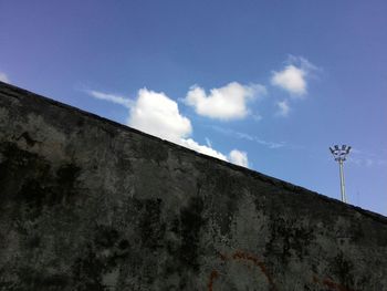 Low angle view of built structure against blue sky