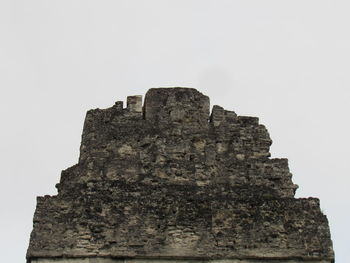 Low angle view of fort against clear sky