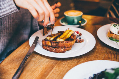 Close-up of woman having breakfast