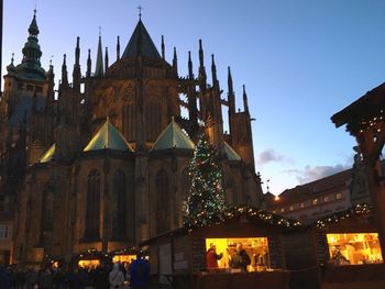 Low angle view of illuminated cathedral against sky