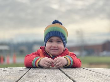 Portrait of cute boy wearing hat