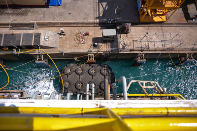 High angle view of boat on sea at harbor