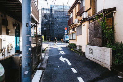 Narrow alley along buildings