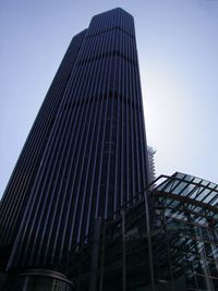 Low angle view of modern building against clear sky