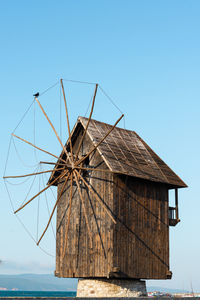 Bulgaria, nessebar, july 18, 2020. old wooden mill near the black sea in the old part of nessebar.