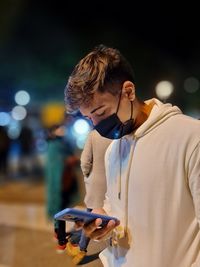 Young woman using mobile phone