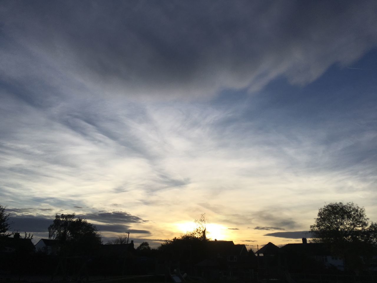 LOW ANGLE VIEW OF SILHOUETTE TREES AGAINST SUNSET SKY