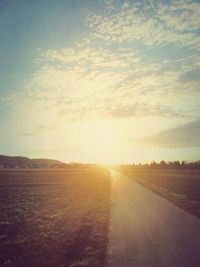 Scenic view of landscape against sky during sunset