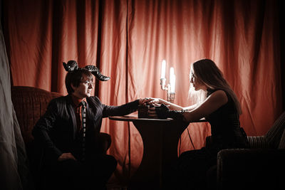 Young couple sitting on seat