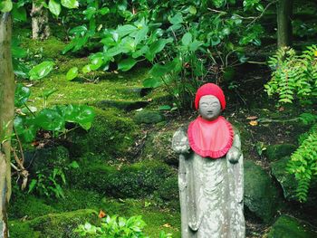 View of statue against trees