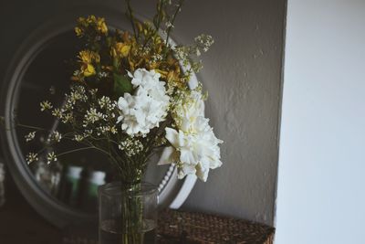 Close-up of white flowers in vase