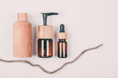 Close-up of bottles against white background