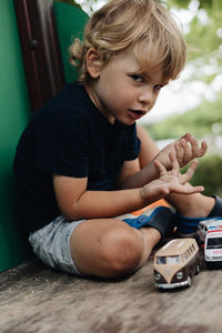 Boy playing with toy blocks