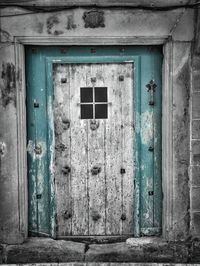 Closed wooden door of house