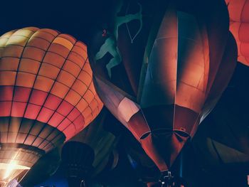 Low angle view of hot air balloon at night