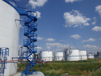 Low angle view of factory against sky