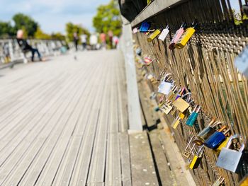 Padlocks on bridge railing