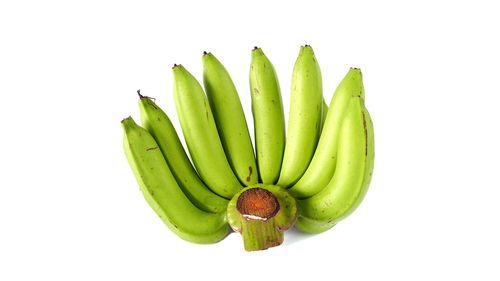 Close-up of fruit over white background