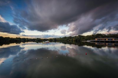 Scenic view of storm clouds over water