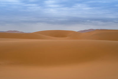 Scenic view of desert against sky