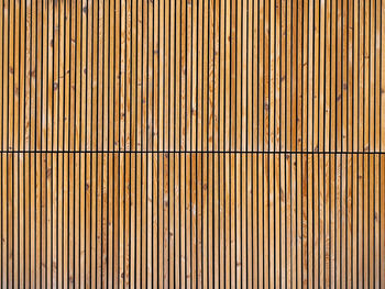 Background of vertically arranged wooden bars