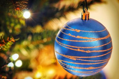 Close-up of illuminated christmas tree at night