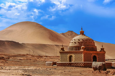 View of temple building against sky