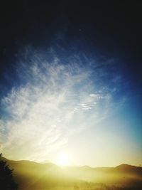 Low angle view of silhouette mountain against sky during sunset