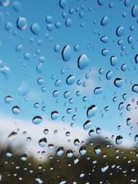 Full frame shot of wet glass window