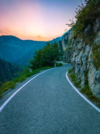 Curving mountain road on a summer evening