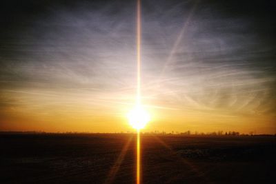 Scenic view of sunset over landscape