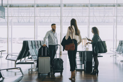 Group of people waiting at airport