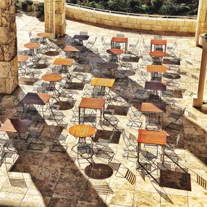 High angle view of chairs in row